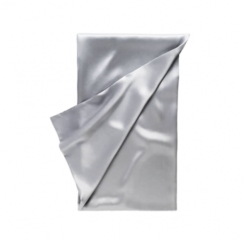 a folded silver grey silk pillowcase